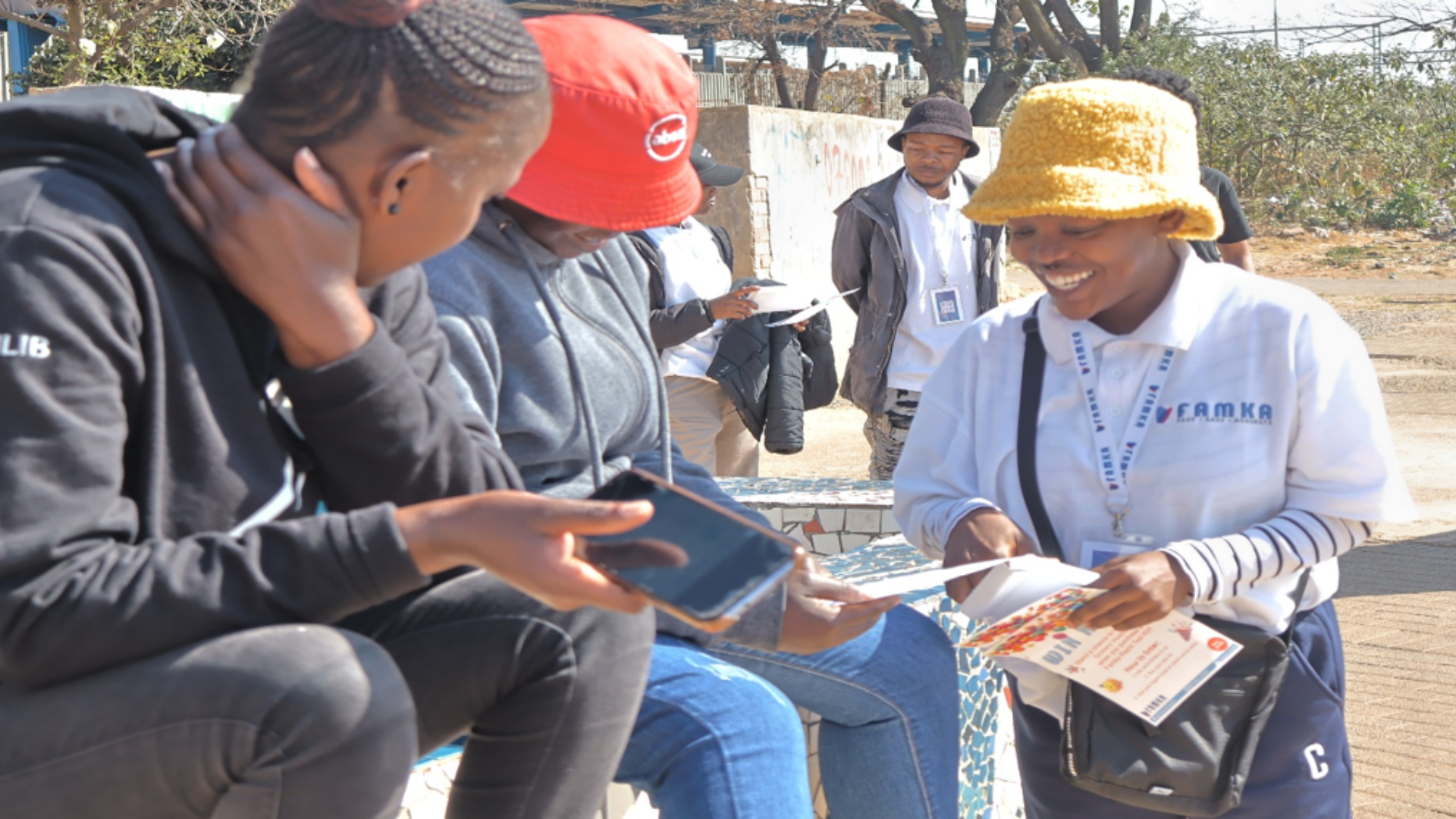 Tuu Post field agents enrolling workers in the community