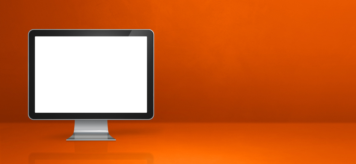 Computer on Orange Desk Banner